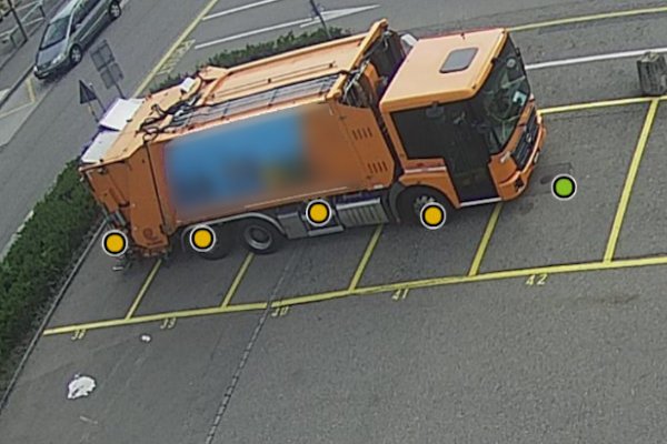 Parquery detects vehicles even if they are parked over four spaces