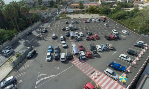 Large outdoor parking lots are best monitored by camera-based systems.